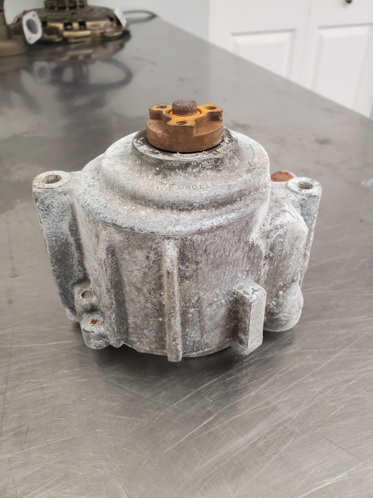 Before vapor honing pump body, oxidized aluminum and steel.